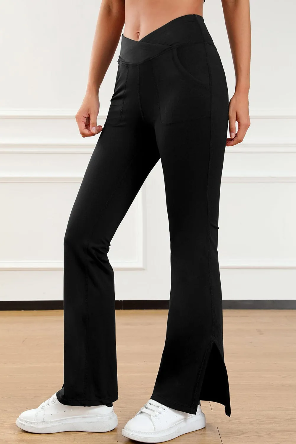 Black Crisscross Waist Flare Leggings with Split Hem and Pockets