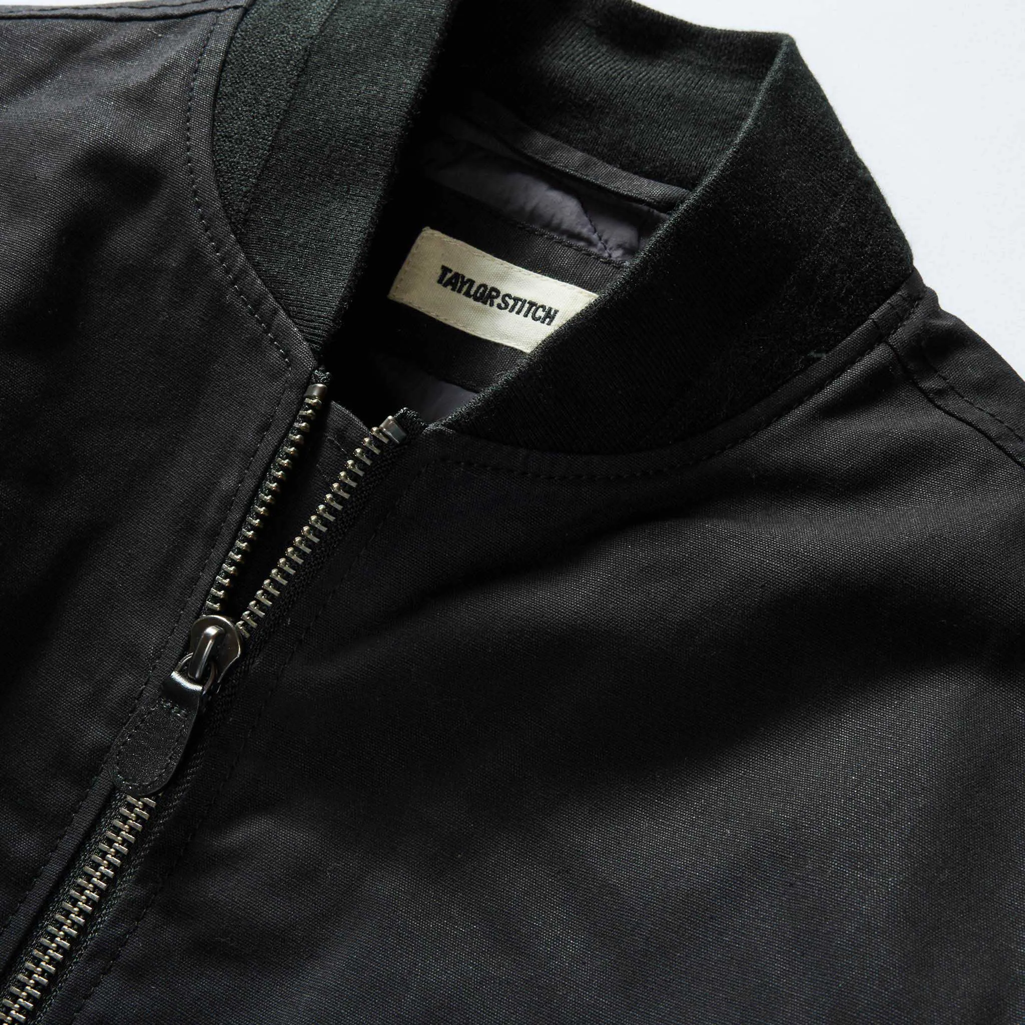 The Insulated Bomber Jacket in Coal Dry Wax